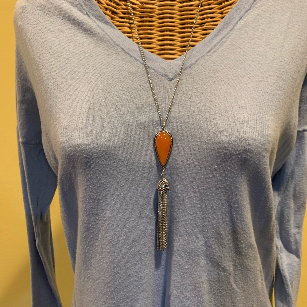 silver and orange pendant necklace and earring set